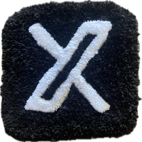 small X logo rug